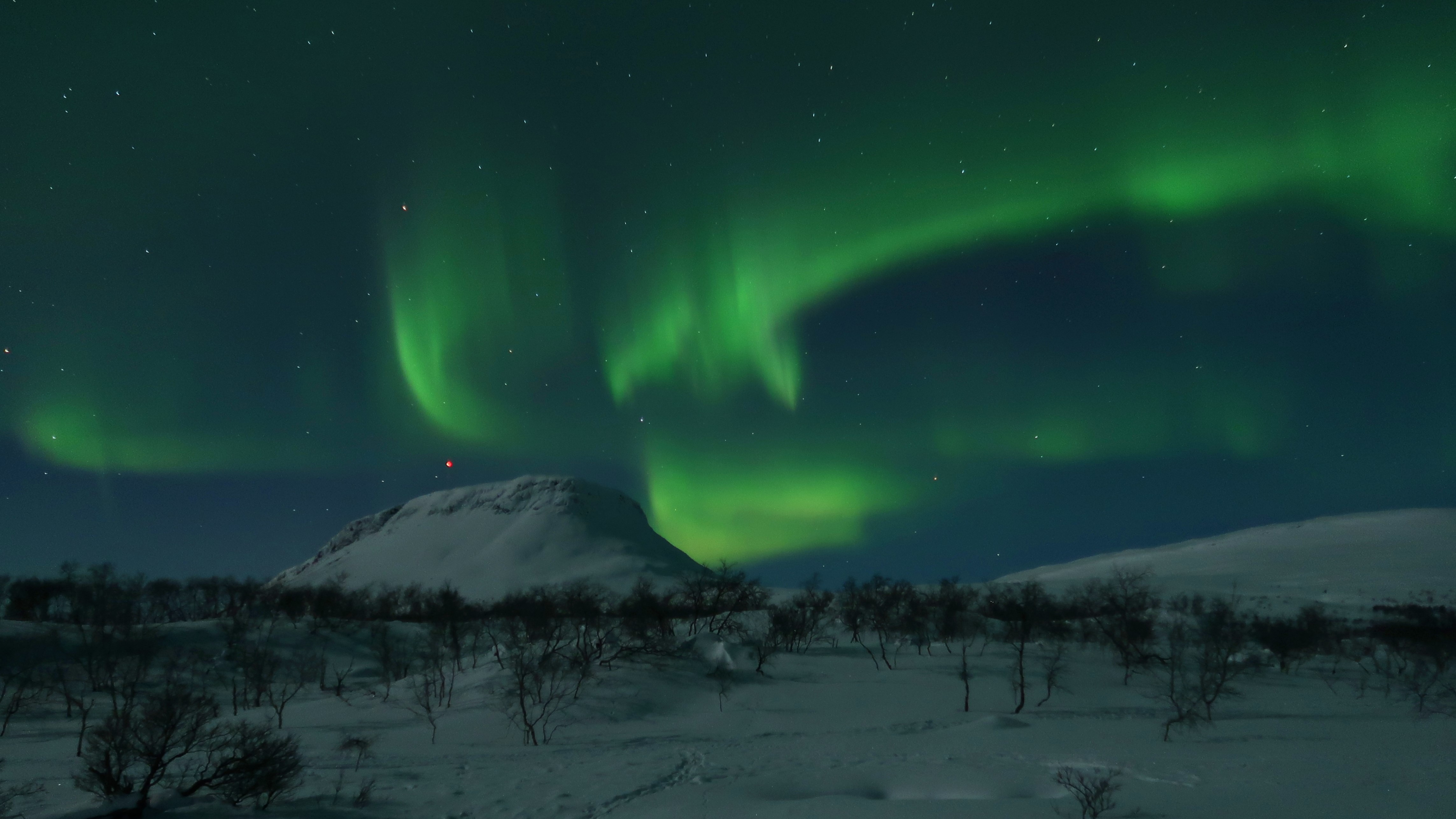 Northern lights above Saana fell in Finnish Lapland